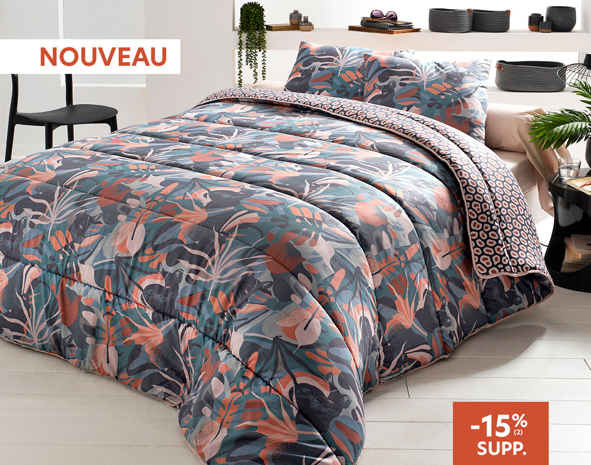 Couette déco double face motif feuillage et panthère